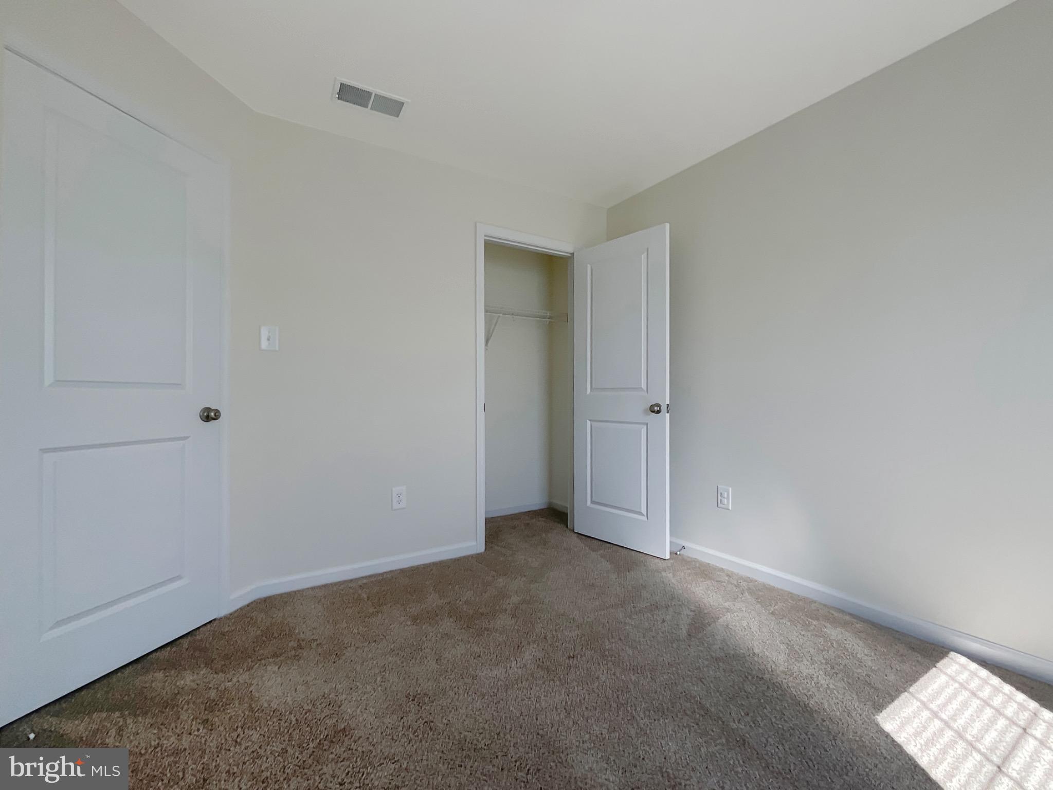 109 Holstein Drive Hanover, PA 17331 - Photo 13 of 26 an empty room with an entryway