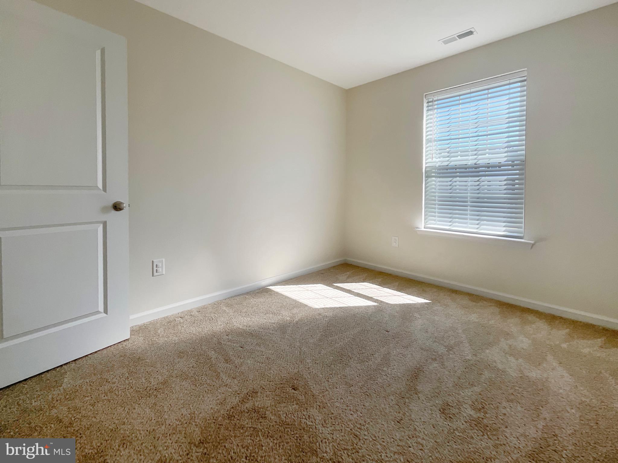 109 Holstein Drive Hanover, PA 17331 - Photo 14 of 26 an empty room with a window