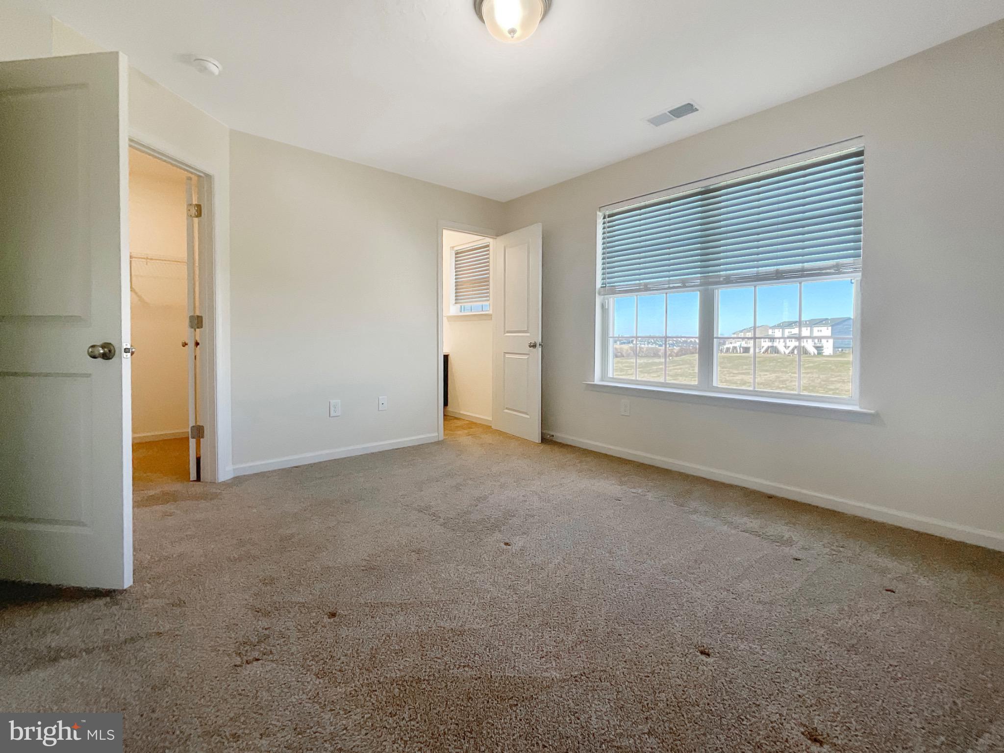 109 Holstein Drive Hanover, PA 17331 - Photo 15 of 26 a view of an empty room with a window