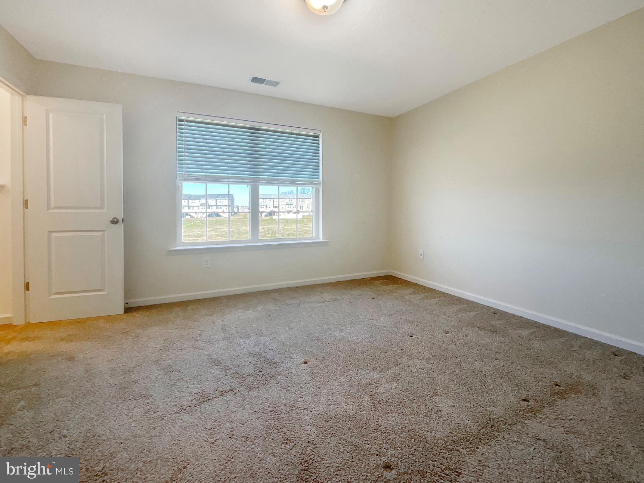 109 Holstein Drive Hanover, PA 17331 - Photo 16 of 26 an empty room with a window