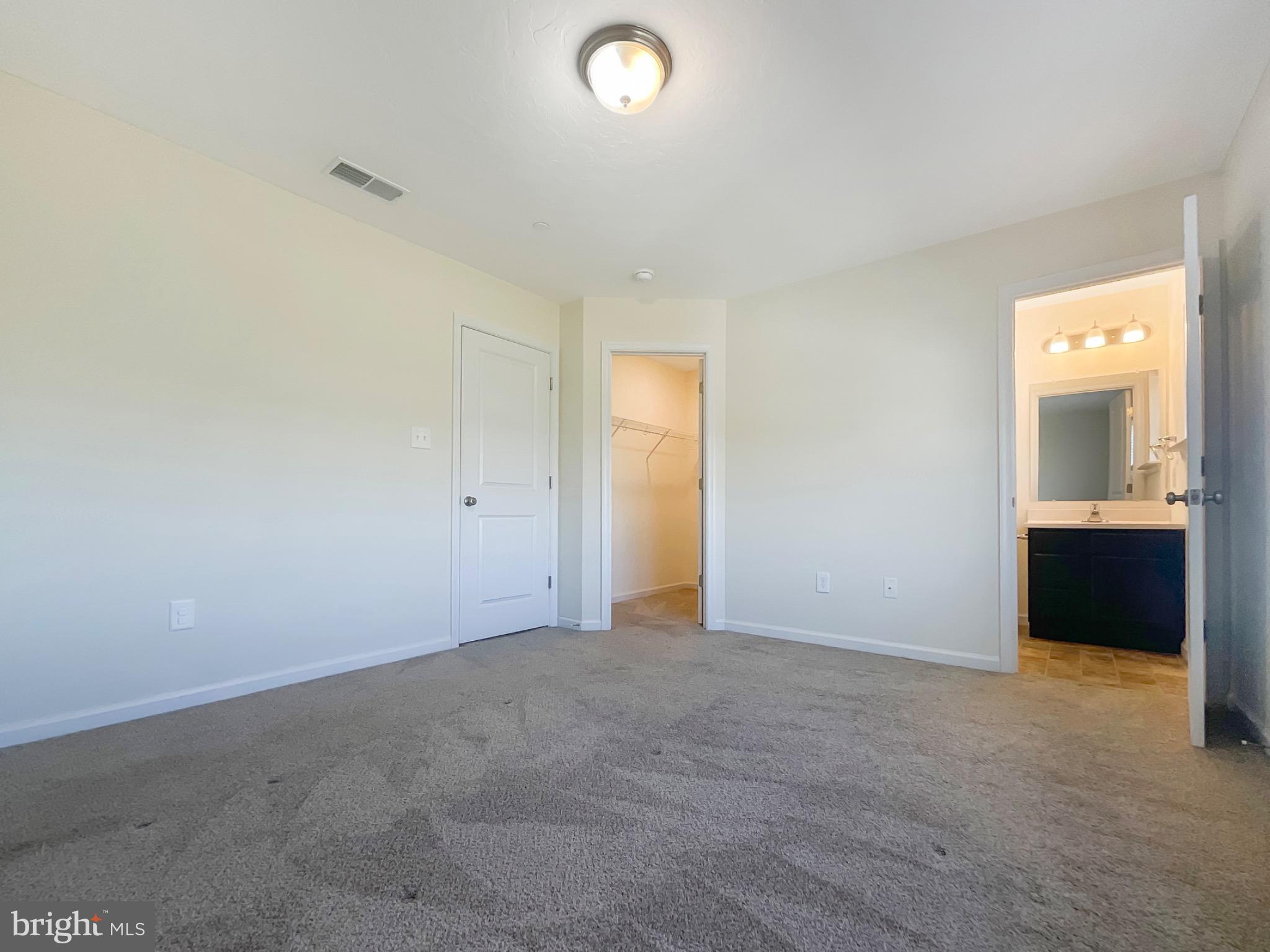 109 Holstein Drive Hanover, PA 17331 - Photo 17 of 26 a view of an empty room with a window