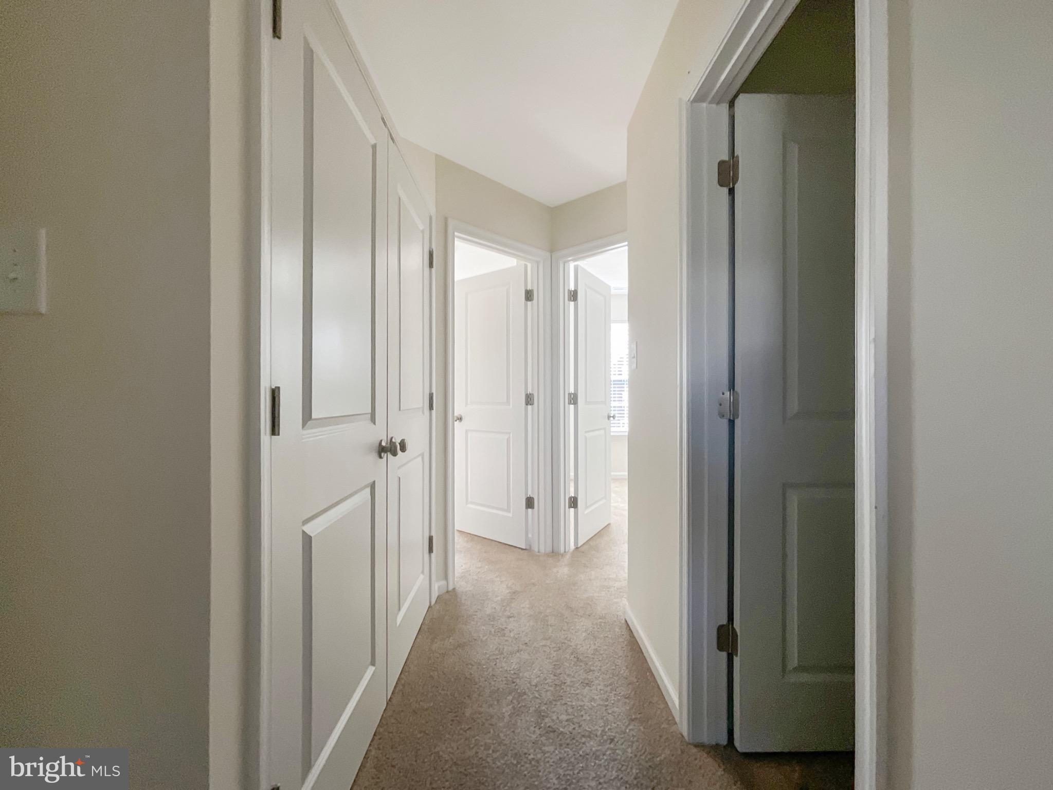 109 Holstein Drive Hanover, PA 17331 - Photo 10 of 26 a view of a hallway with closet and a bathroom