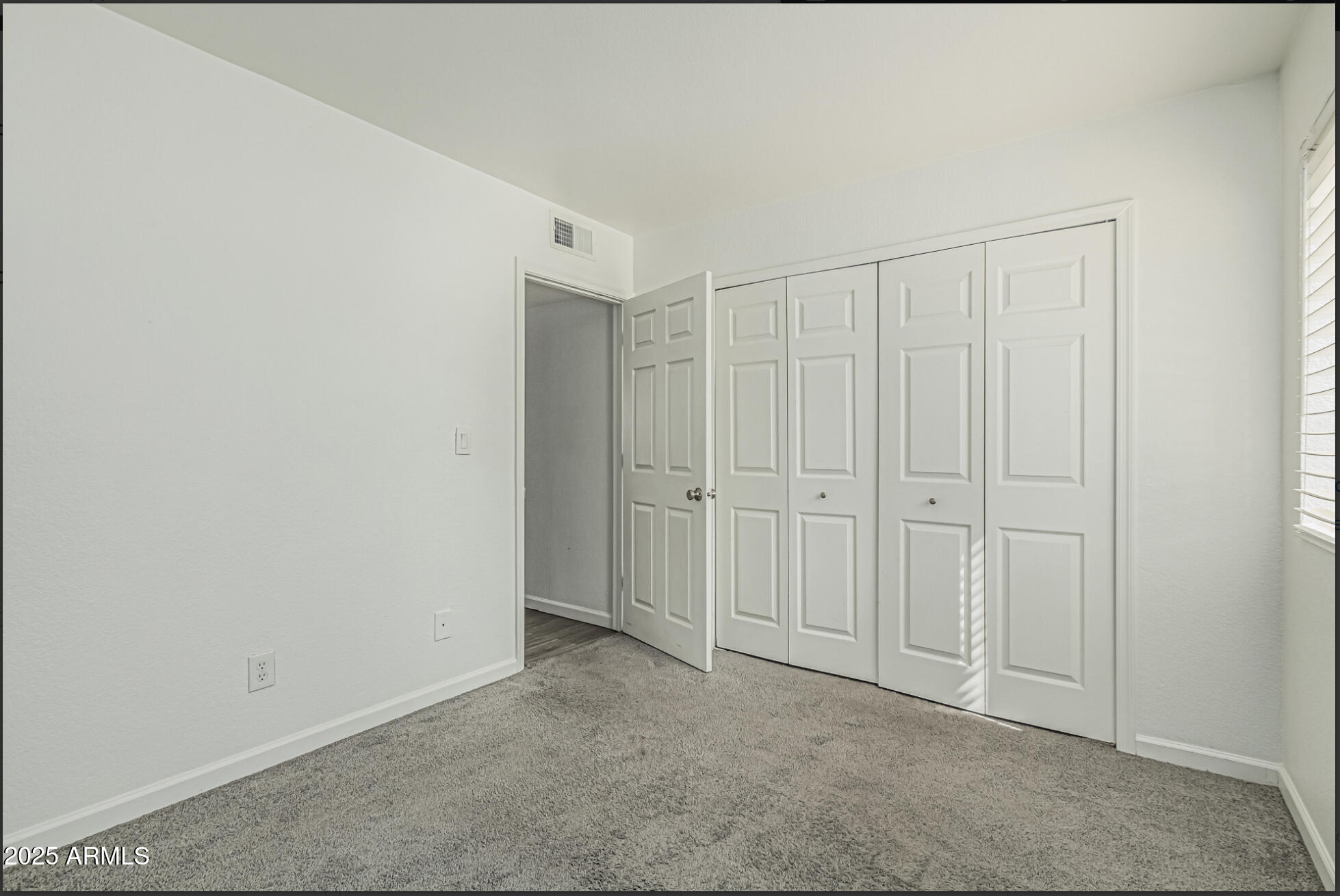 1065 West 1st Street, Unit 102 Tempe, AZ 85281 - Photo 12 of 24 a view of an empty room