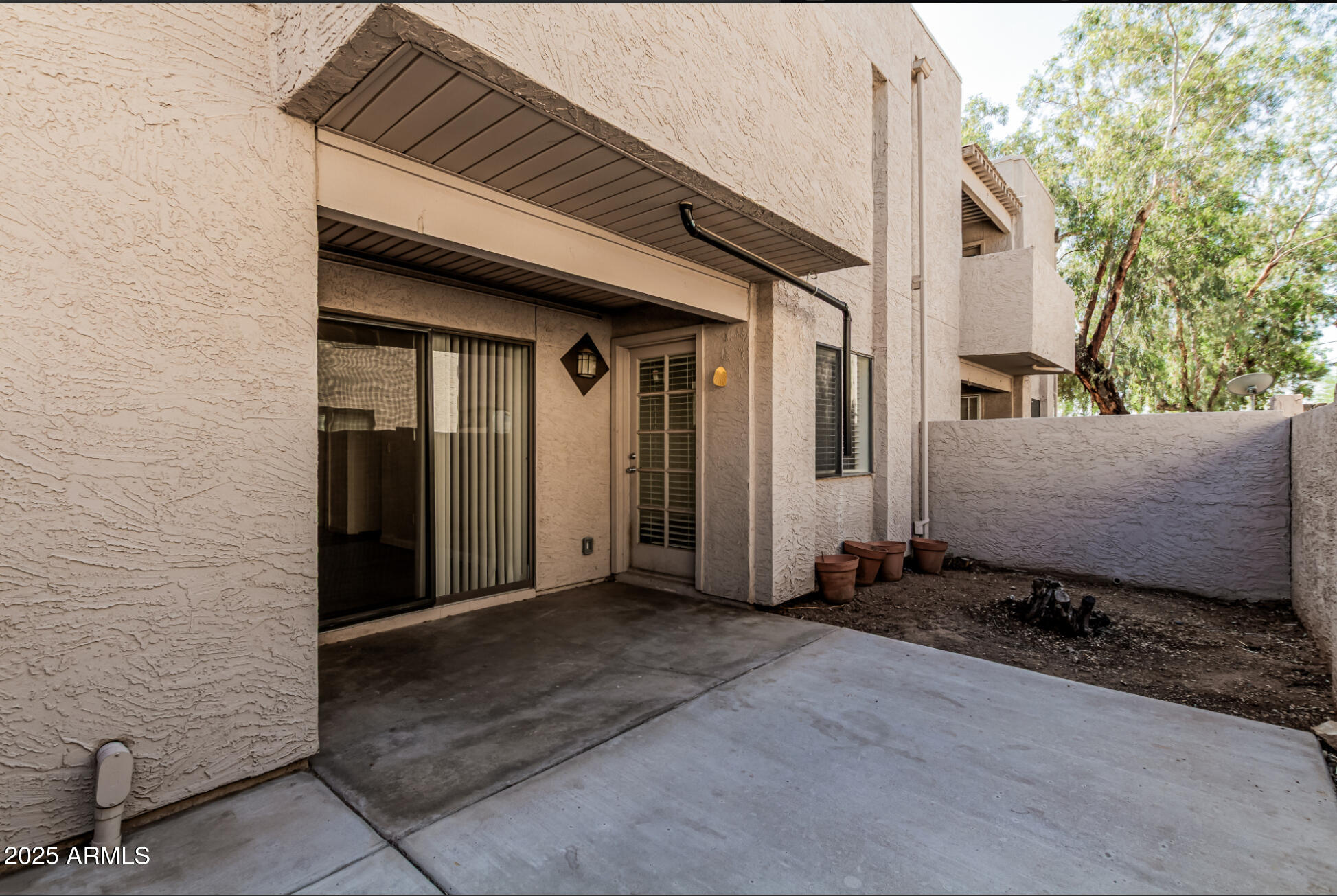 1065 West 1st Street, Unit 102 Tempe, AZ 85281 - Photo 20 of 24 a front view of a house