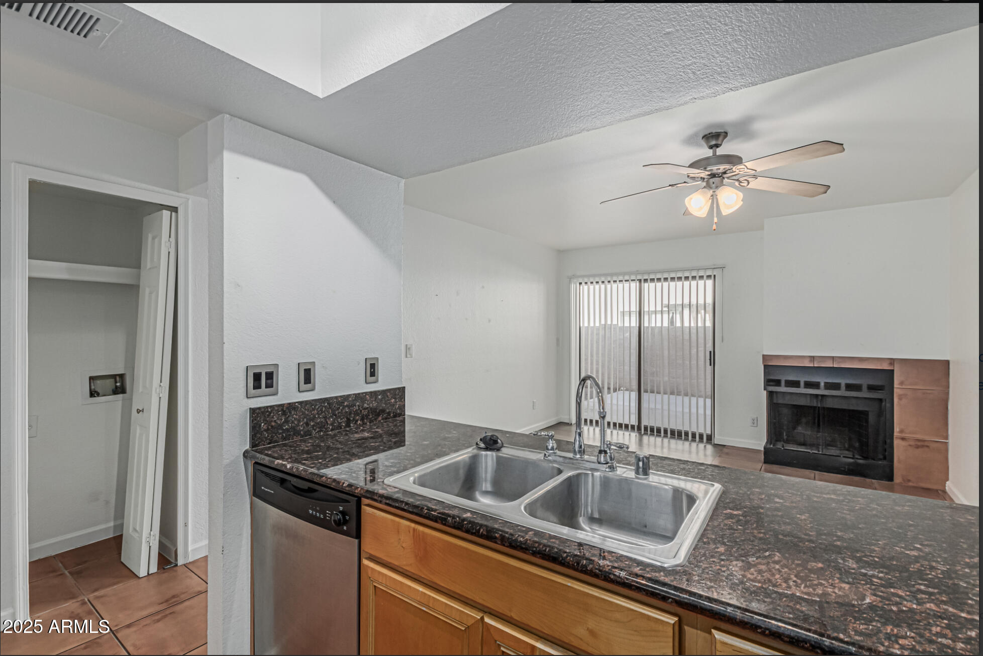 1065 West 1st Street, Unit 102 Tempe, AZ 85281 - Photo 8 of 24 a kitchen with sink stove and refrigerator