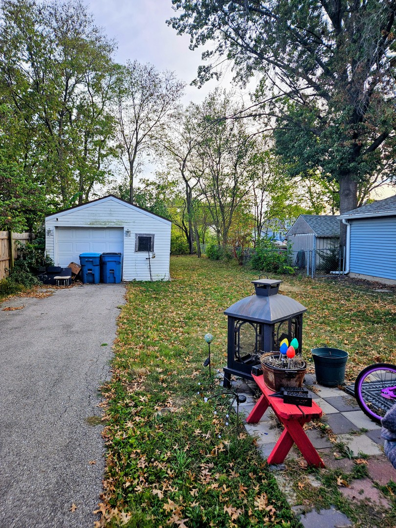 1213 West Main Street Ottawa, IL 61350 - Photo 11 of 11 a view of house with outdoor seating