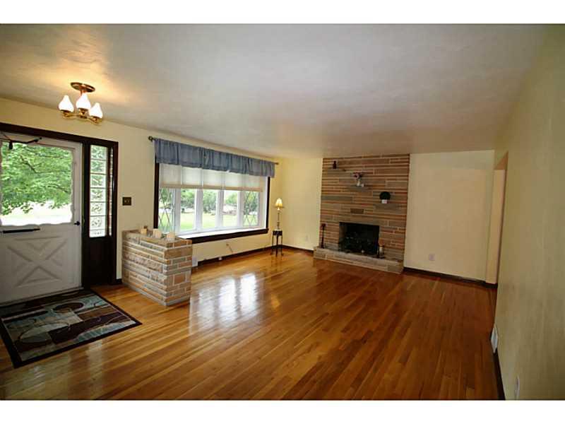 5530 Gibson Road Gibsonia, PA 15044 - Photo 2 of 14 Living Room. Refinished hardwood floors, fireplace