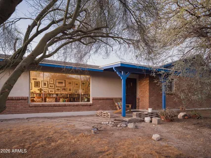 a house with trees in front of it