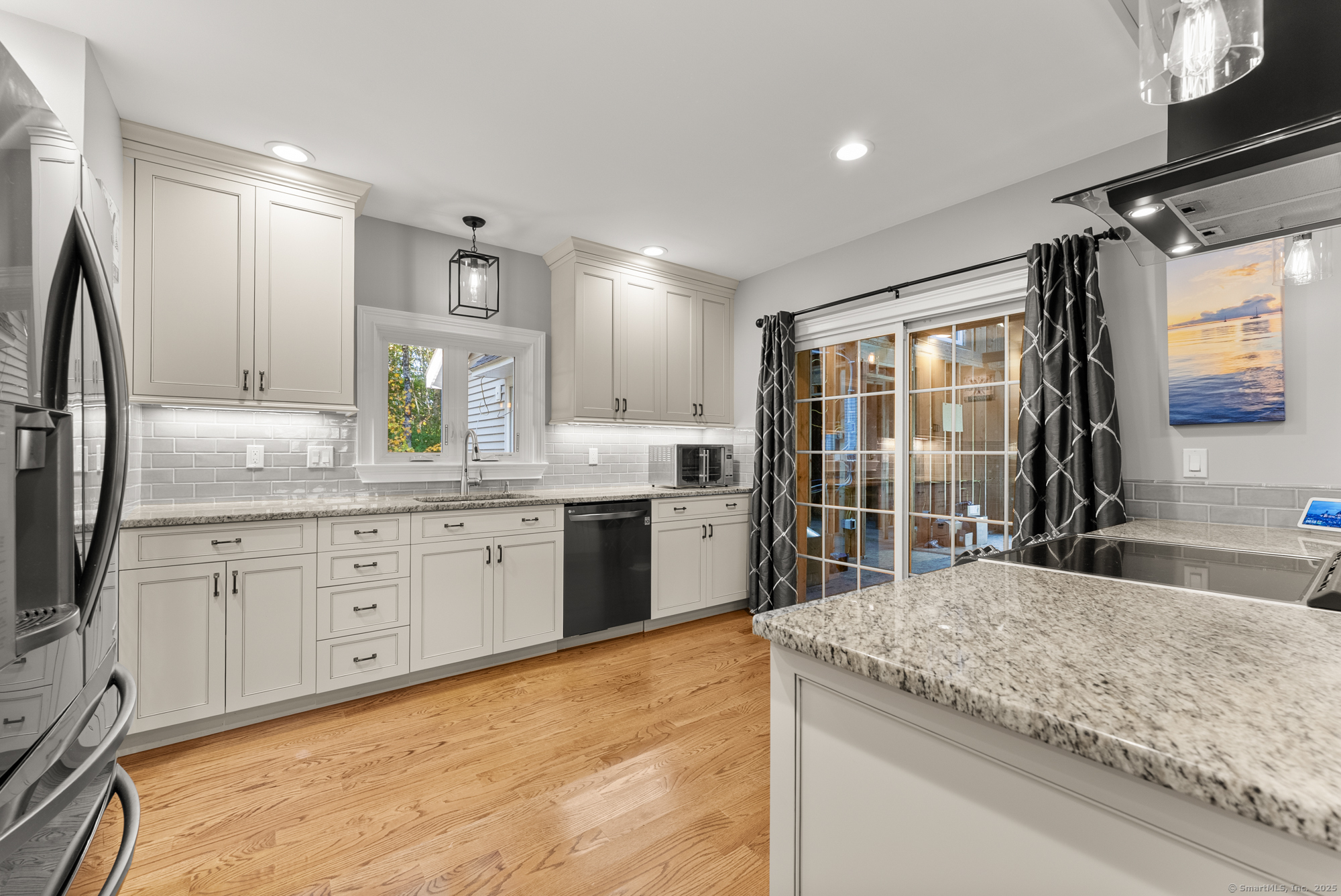 44 Bantam Lake Heights Morris, CT 06763 - Photo 20 of 40 a kitchen with stainless steel appliances granite countertop a sink stove and refrigerator
