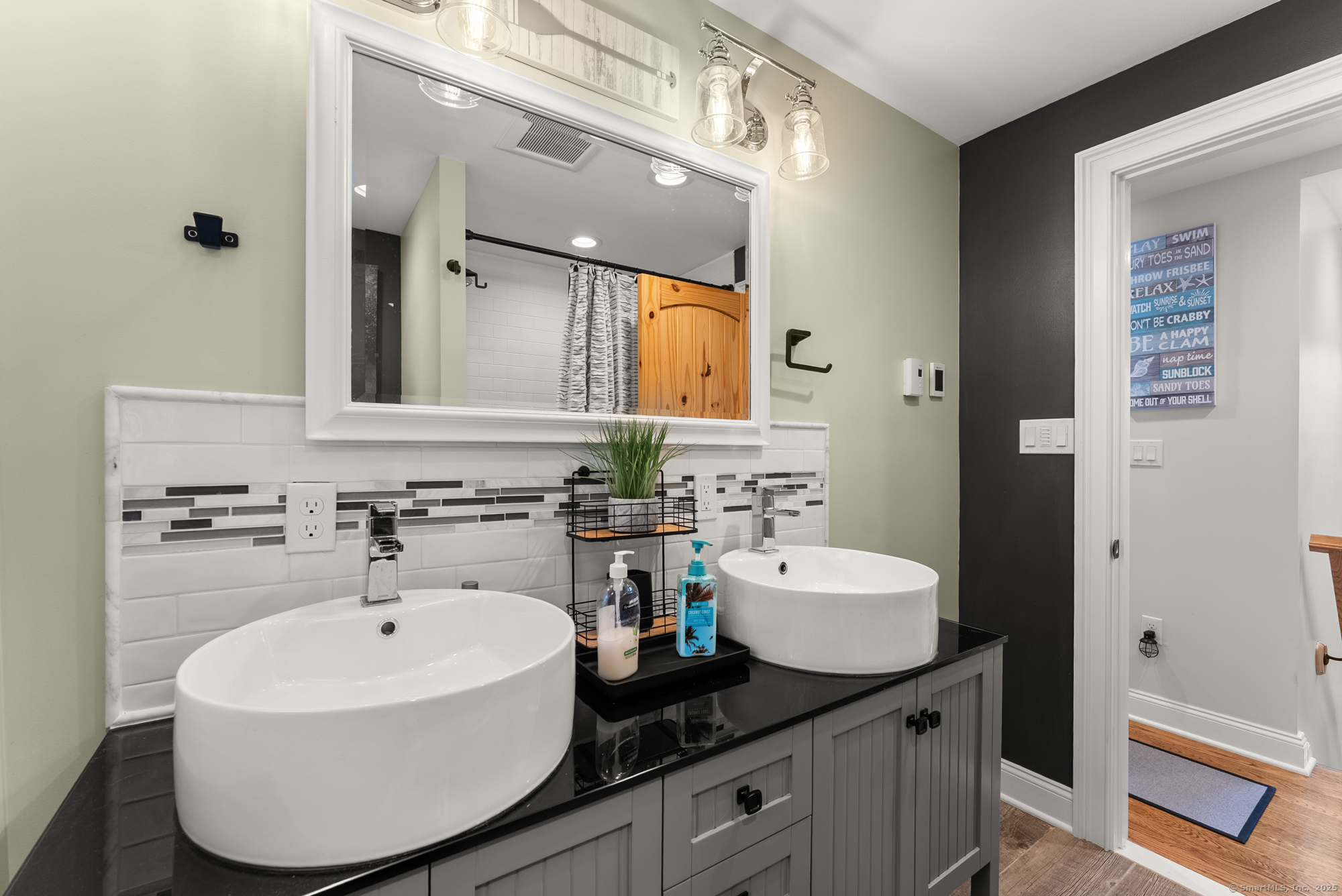 44 Bantam Lake Heights Morris, CT 06763 - Photo 27 of 40 a bathroom with a sink and a mirror