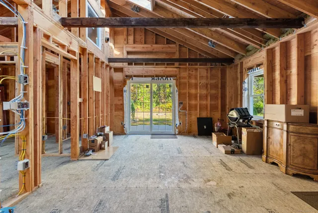 a view of lobby with furniture and staircase