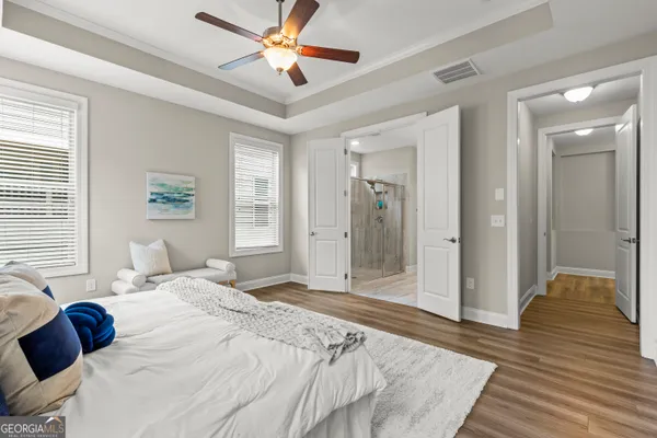 a bathroom with a double vanity sink and mirror