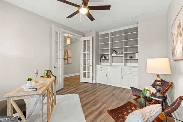 a bed room with a bed and furniture