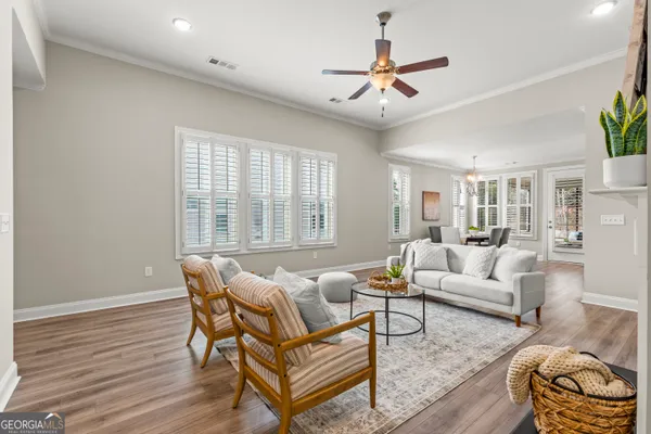 a living room with furniture and a window