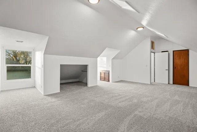 an empty room with a bathroom