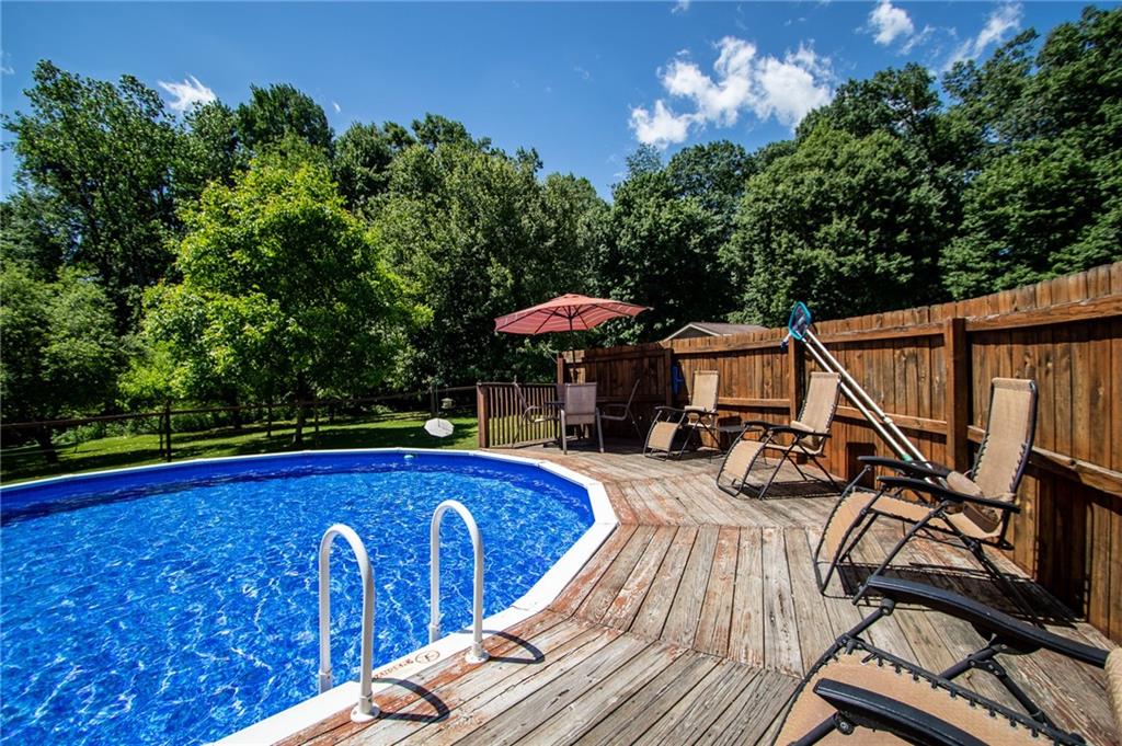 186 Riemer Road Sarver, PA 16055 - Photo 19 of 25 a view of a swimming pool with a lounge chair