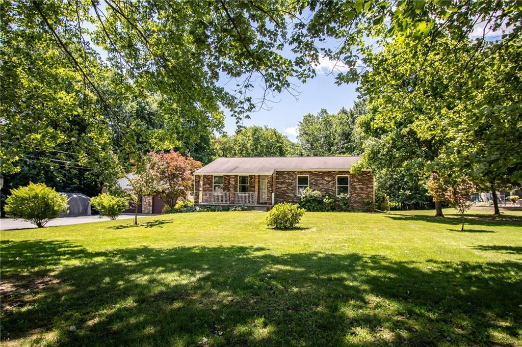 186 Riemer Road Sarver, PA 16055 - Photo 2 of 25 a view of a house with a yard and sitting area