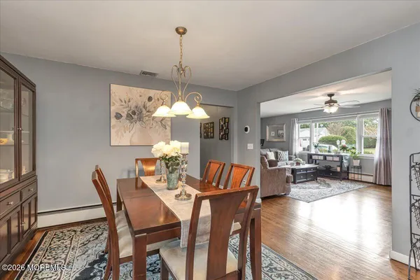 a living room with furniture and large window