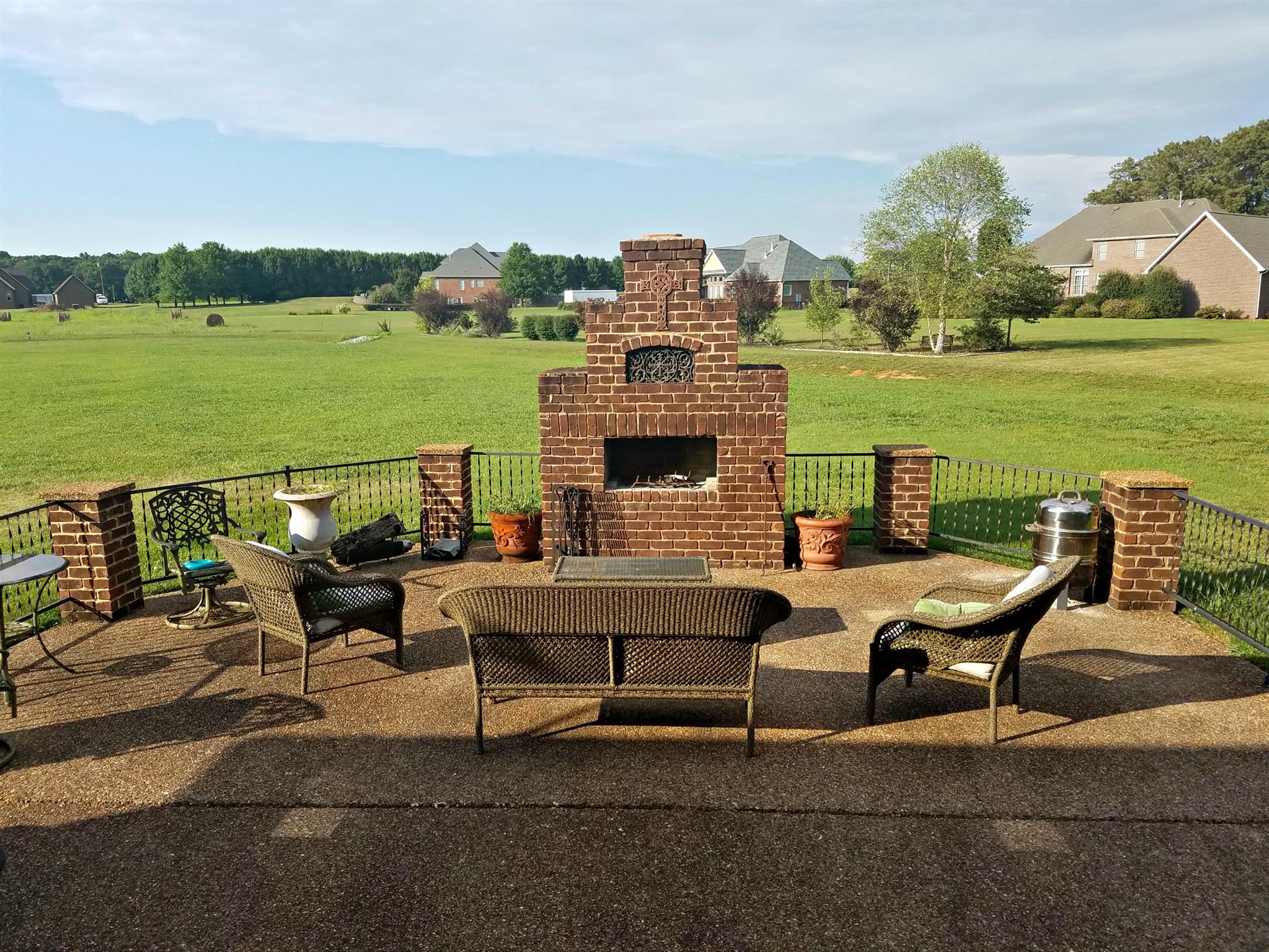 94 Ridgecrest Drive Winchester, TN 37398 - Photo 13 of 13 Entertaining at its best. A great fire pit and a huge patio complete with beautiful iron railing.