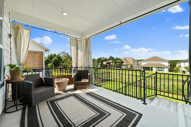 a view of a balcony with couch