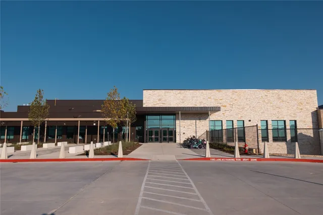a view of a building with a patio