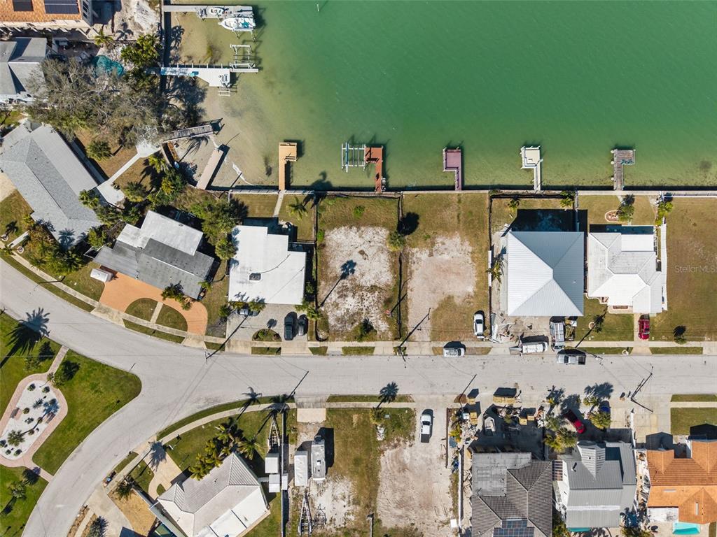 15307 Harbor Drive Madeira Beach, FL 33708 - Photo 12 of 26 an aerial view of a house with a swimming pool