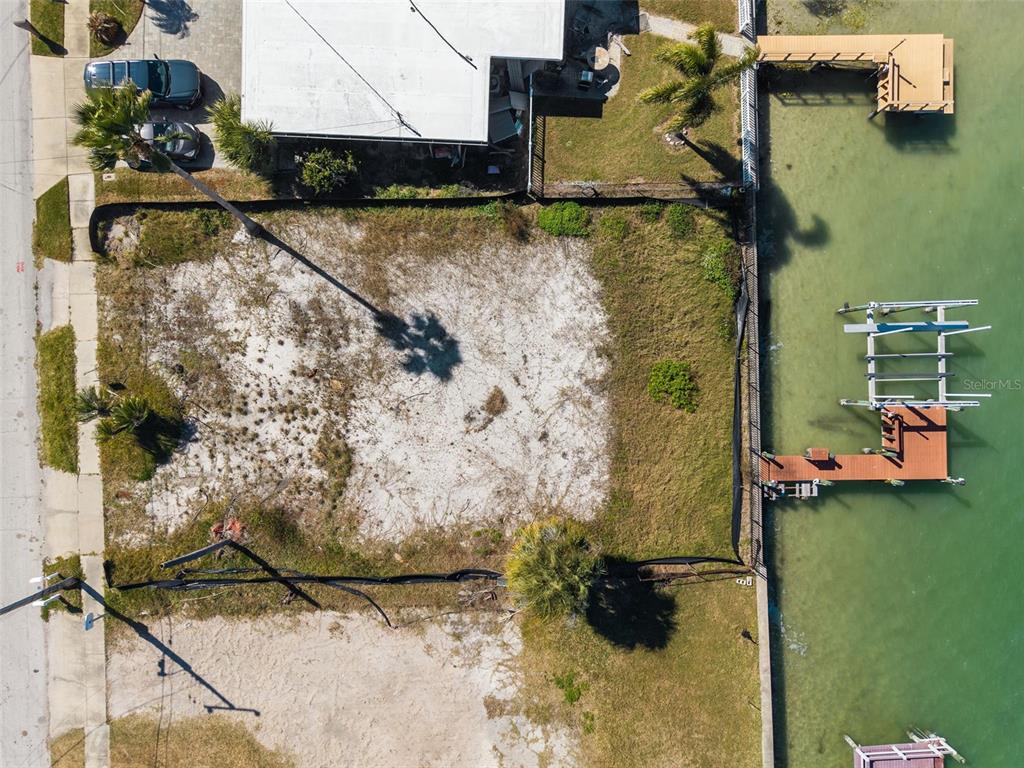 15307 Harbor Drive Madeira Beach, FL 33708 - Photo 23 of 26 a bathroom with a shower and a sink