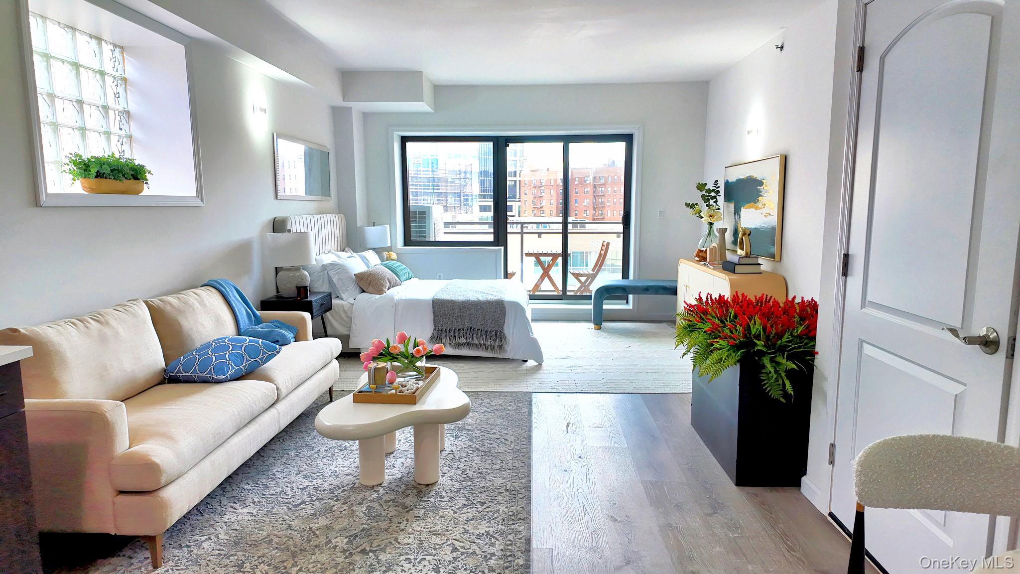 9730 64th Avenue, Unit 3C Queens, NY 11374 - Photo 4 of 5 Living room featuring light wood-style flooring