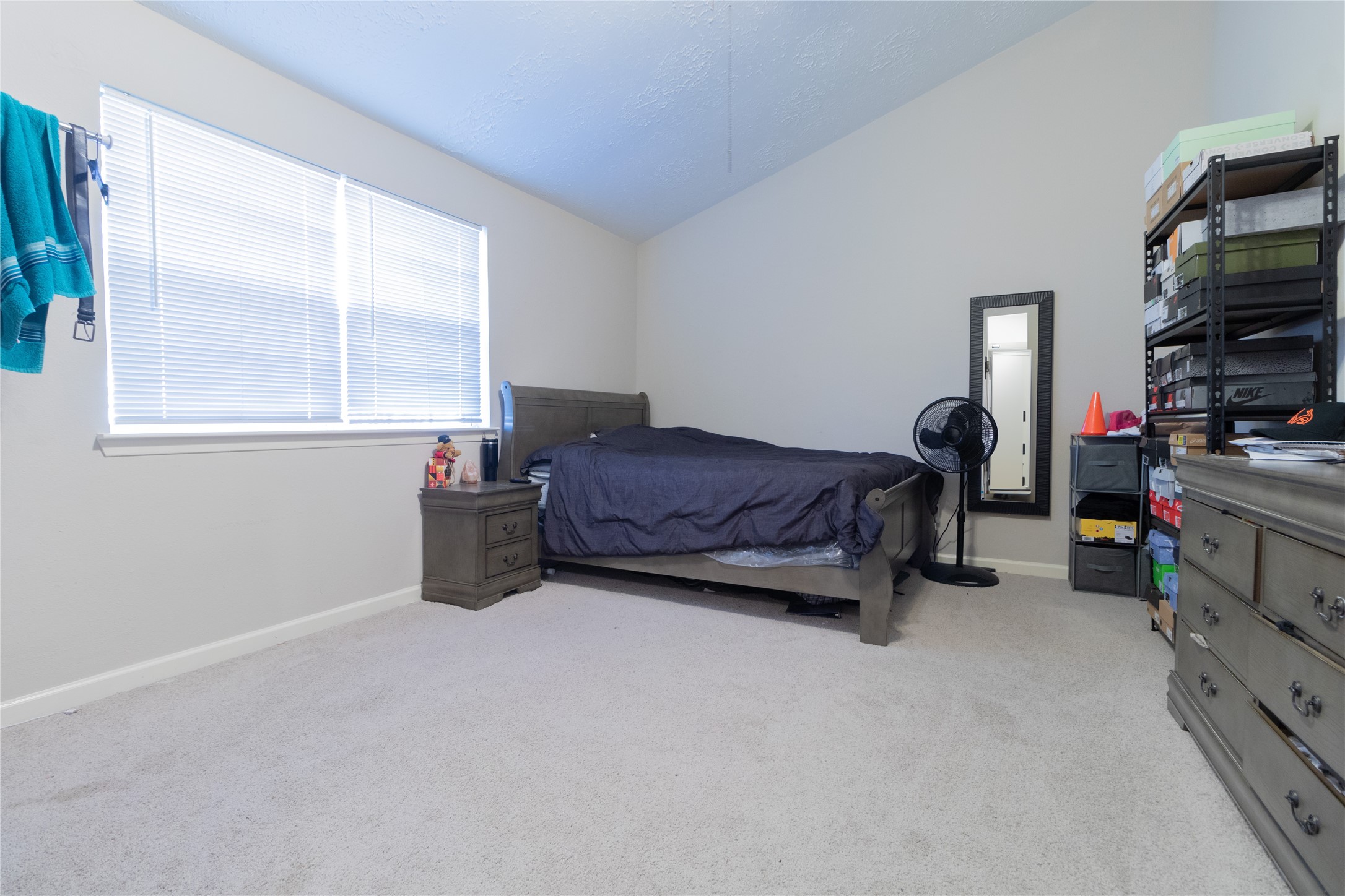 4406 Rosegate Drive Spring, TX 77373 - Photo 4 of 32 Spacious downstairs flex room currently being used as a 4th bedroom.