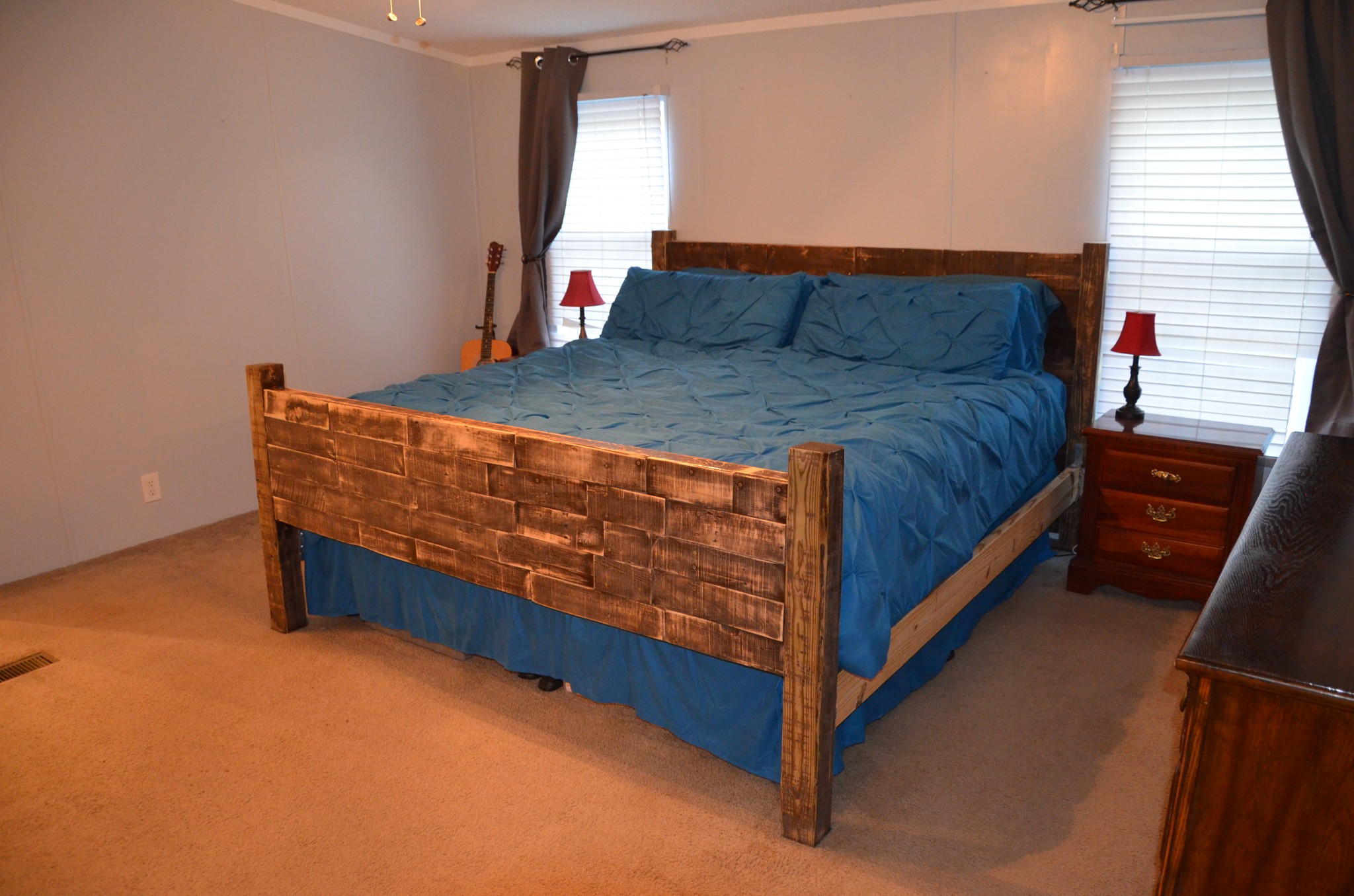 580 Speck Road Lebanon, TN 37087 - Photo 13 of 38 a bed sitting in a bedroom next to a window