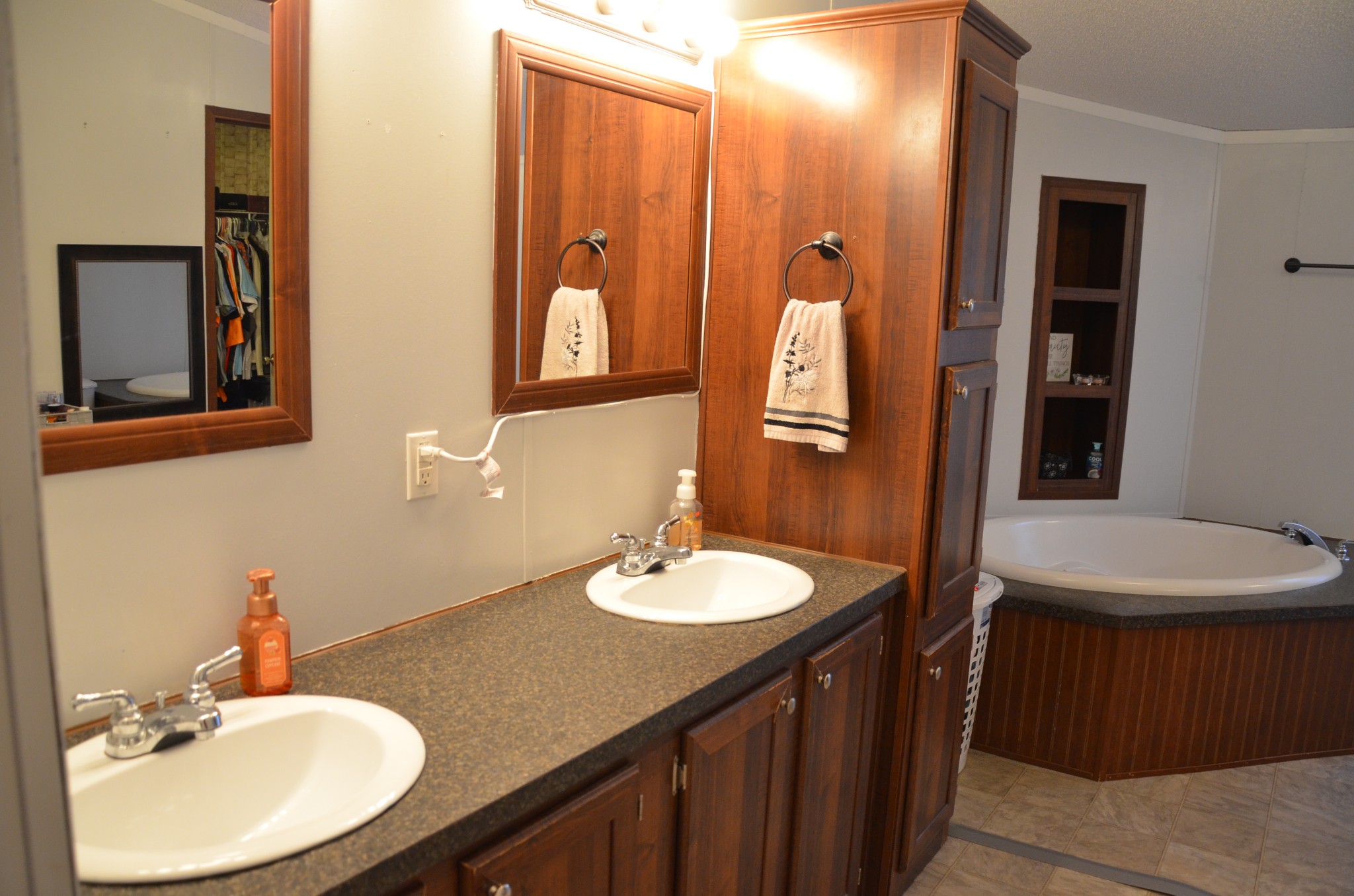 580 Speck Road Lebanon, TN 37087 - Photo 14 of 38 a bathroom with a sink and a mirror