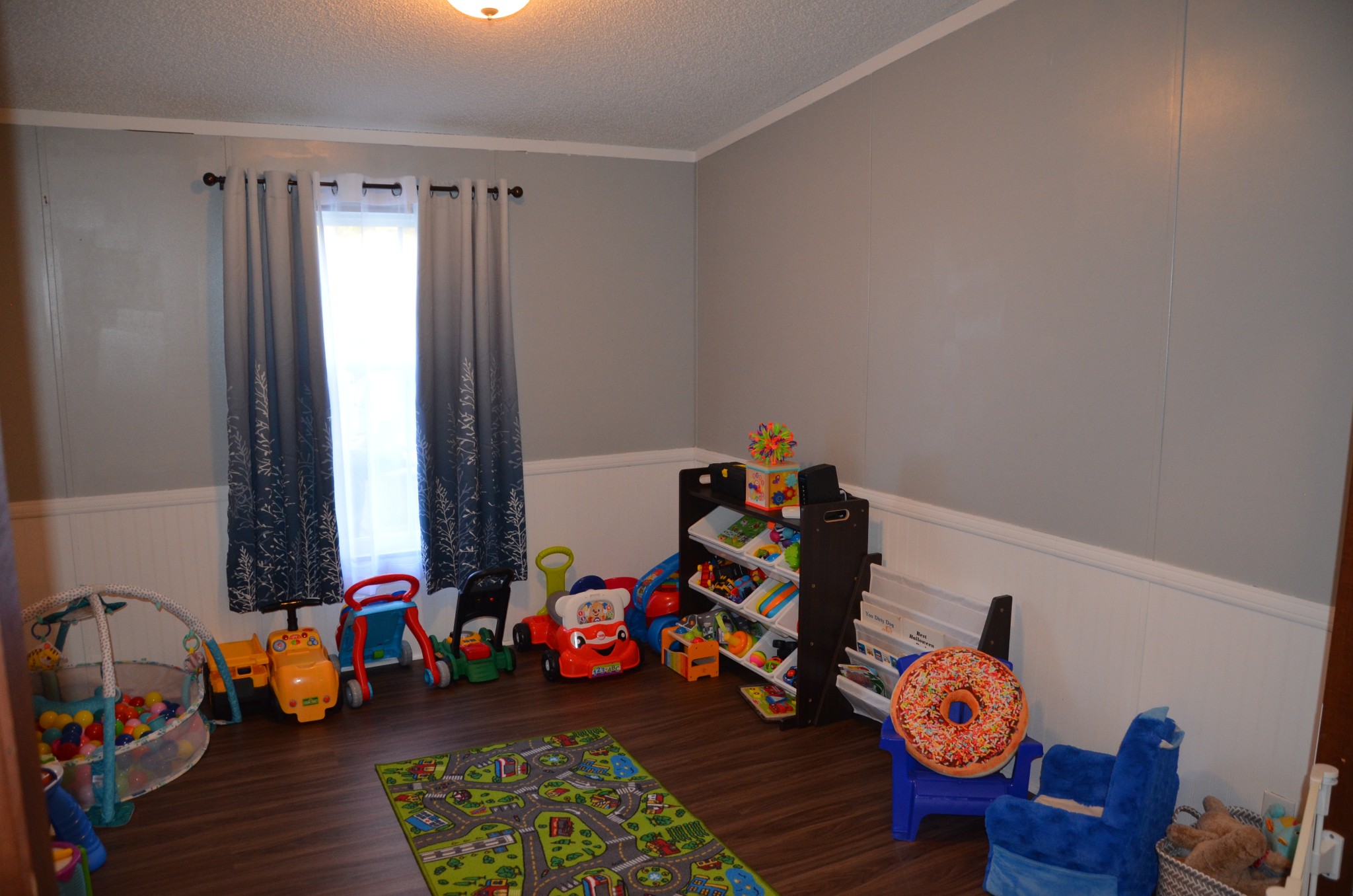 580 Speck Road Lebanon, TN 37087 - Photo 23 of 38 a view of a room with wooden floor and toys