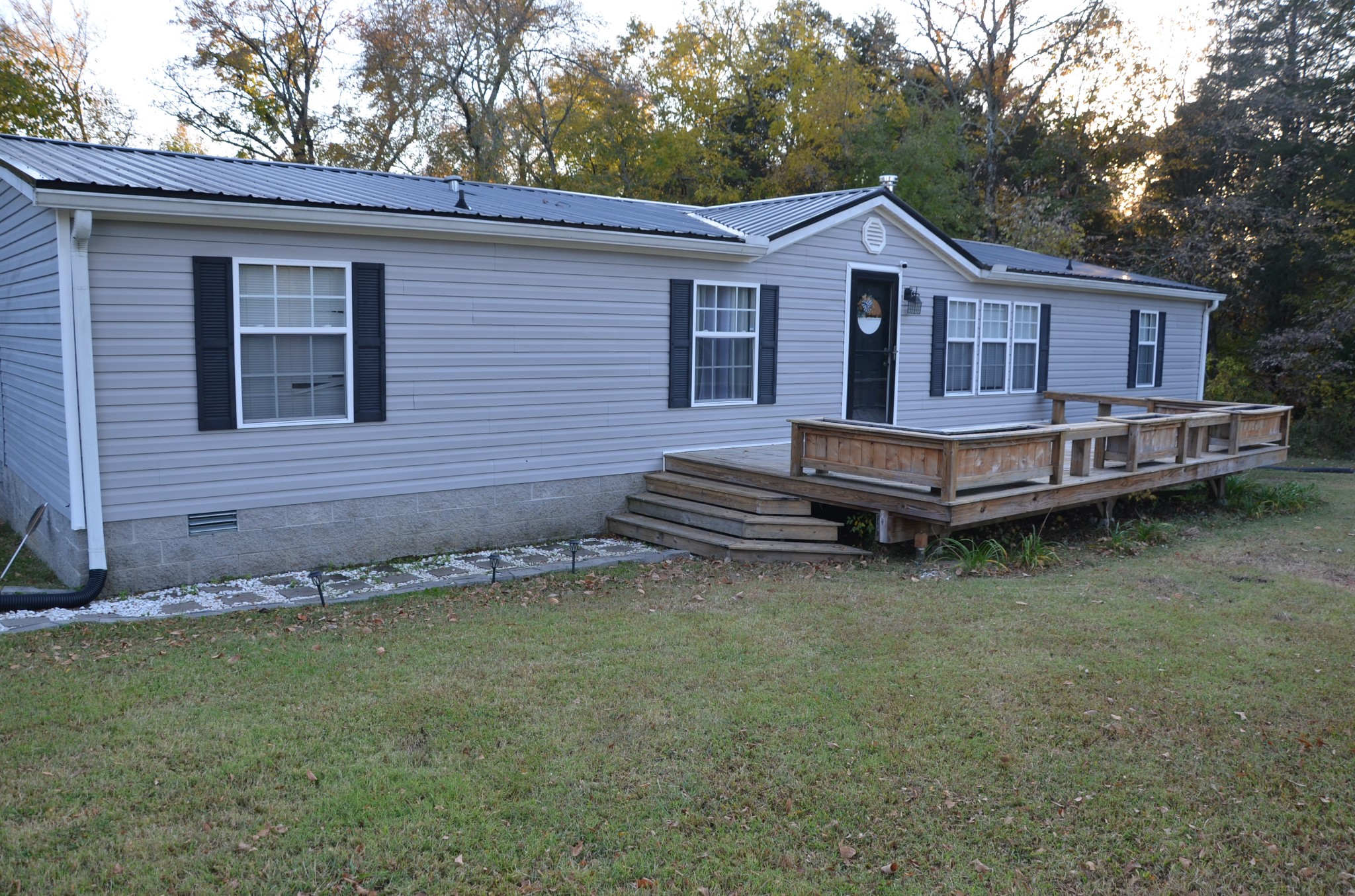 580 Speck Road Lebanon, TN 37087 - Photo 27 of 38 a front view of a house with a garden and yard