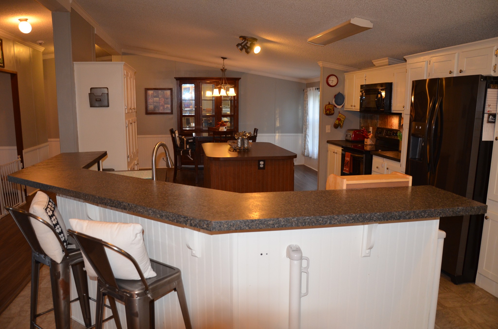 580 Speck Road Lebanon, TN 37087 - Photo 5 of 38 a kitchen with stainless steel appliances granite countertop a sink refrigerator and cabinets