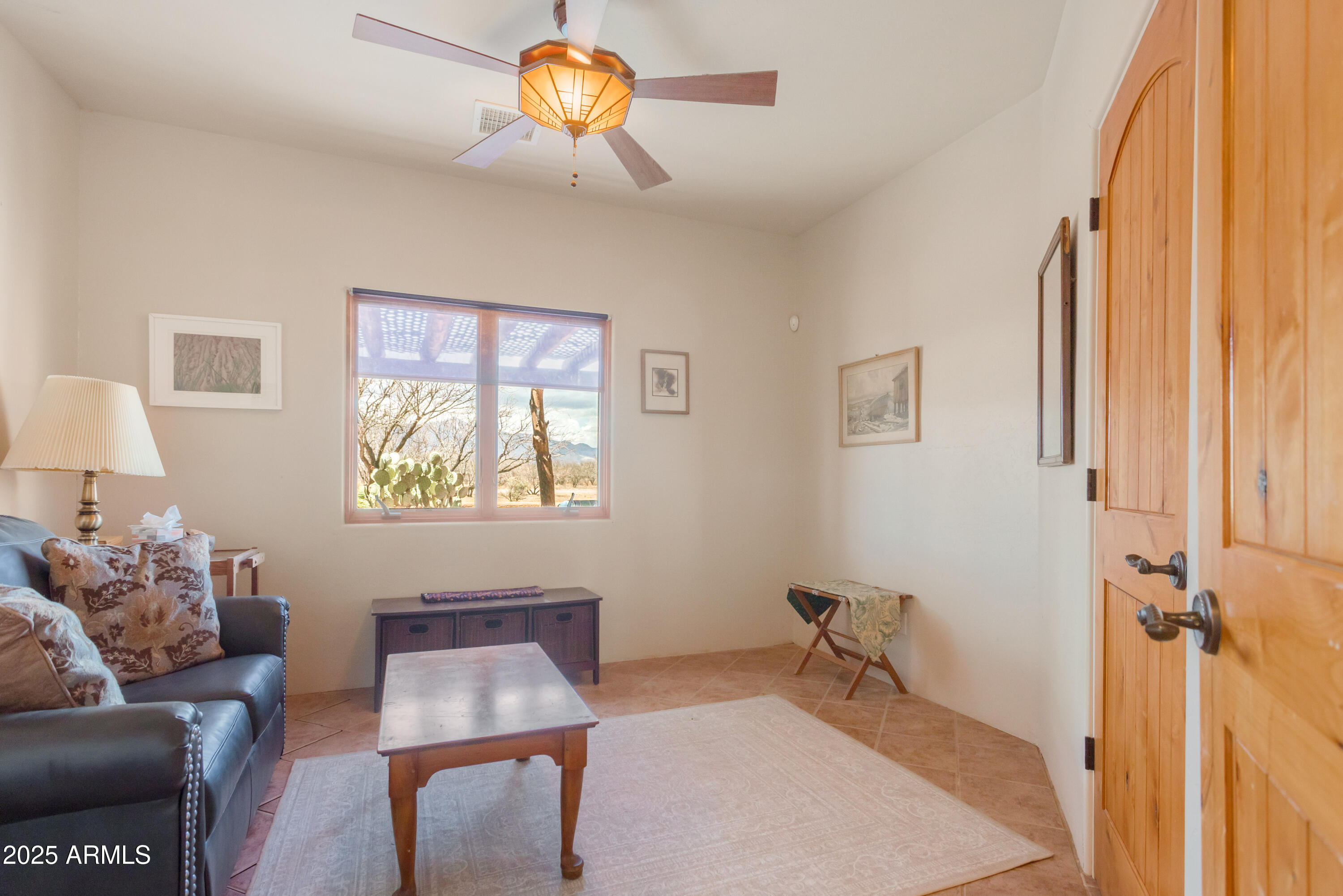 8765 South Airstrip Road Hereford, AZ 85615 - Photo 26 of 47 a room with furniture and a window