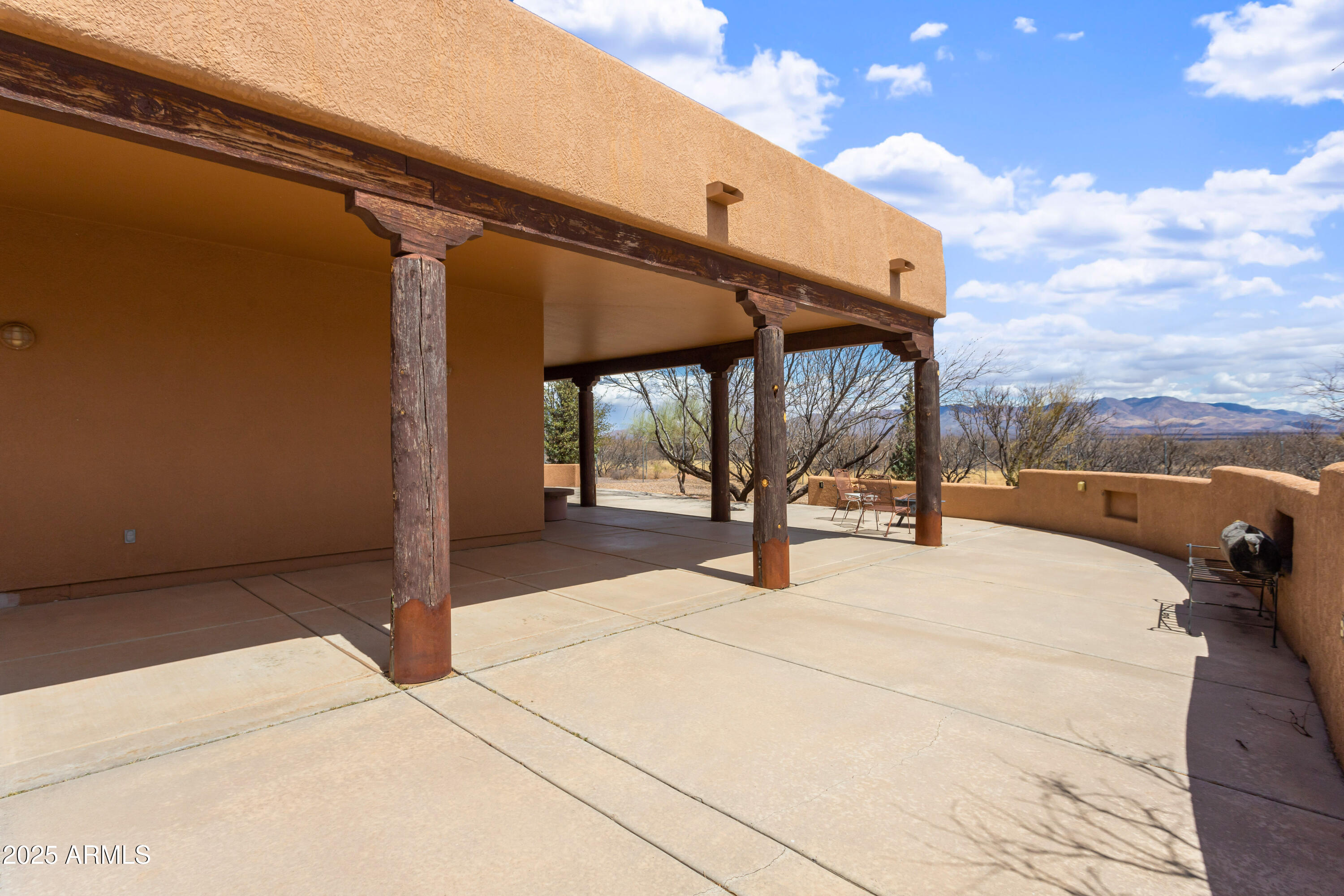 8765 South Airstrip Road Hereford, AZ 85615 - Photo 31 of 47 a view of an outdoor space and porch