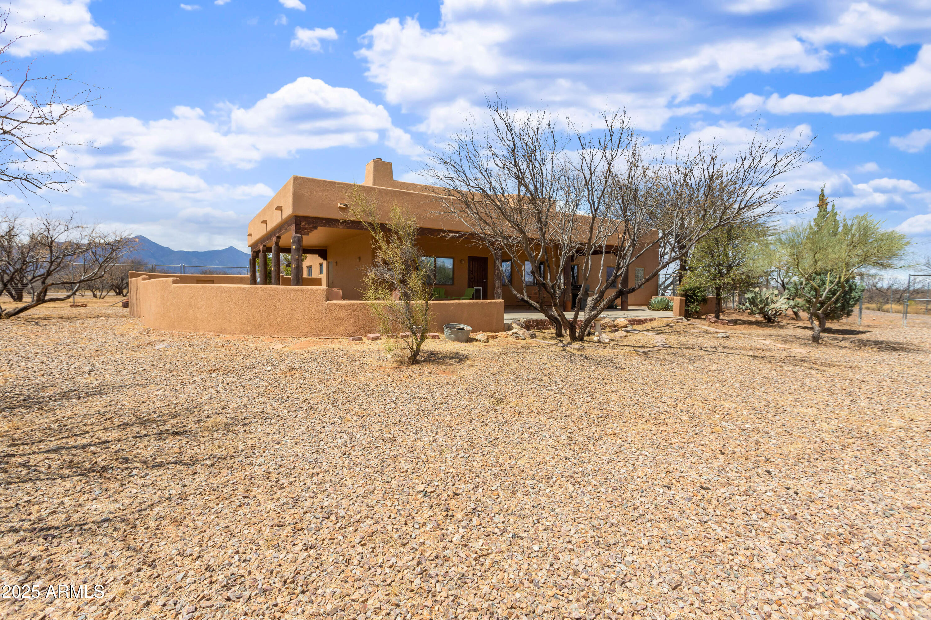 8765 South Airstrip Road Hereford, AZ 85615 - Photo 34 of 47 a view of a house with snow on the road