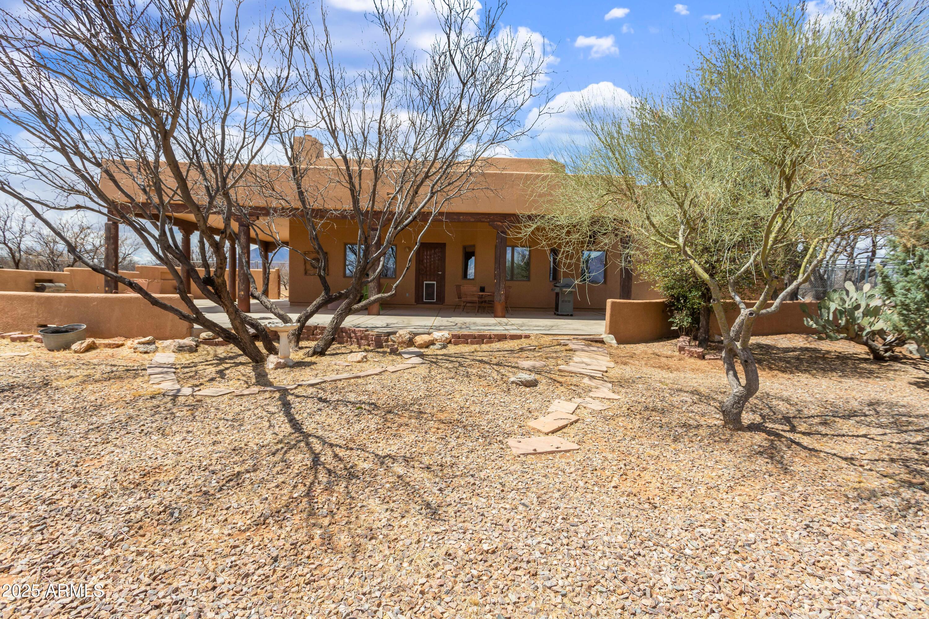 8765 South Airstrip Road Hereford, AZ 85615 - Photo 35 of 47 a view of a house with snow on the yard
