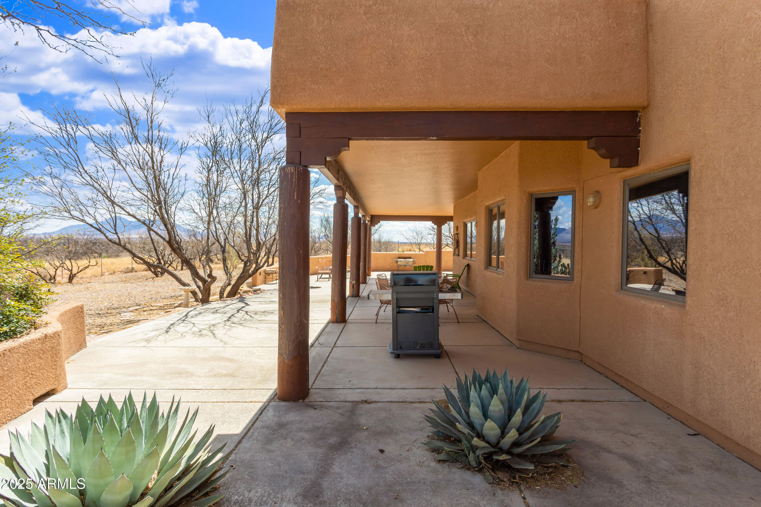 8765 South Airstrip Road Hereford, AZ 85615 - Photo 39 of 47 a lobby with furniture and a potted plant