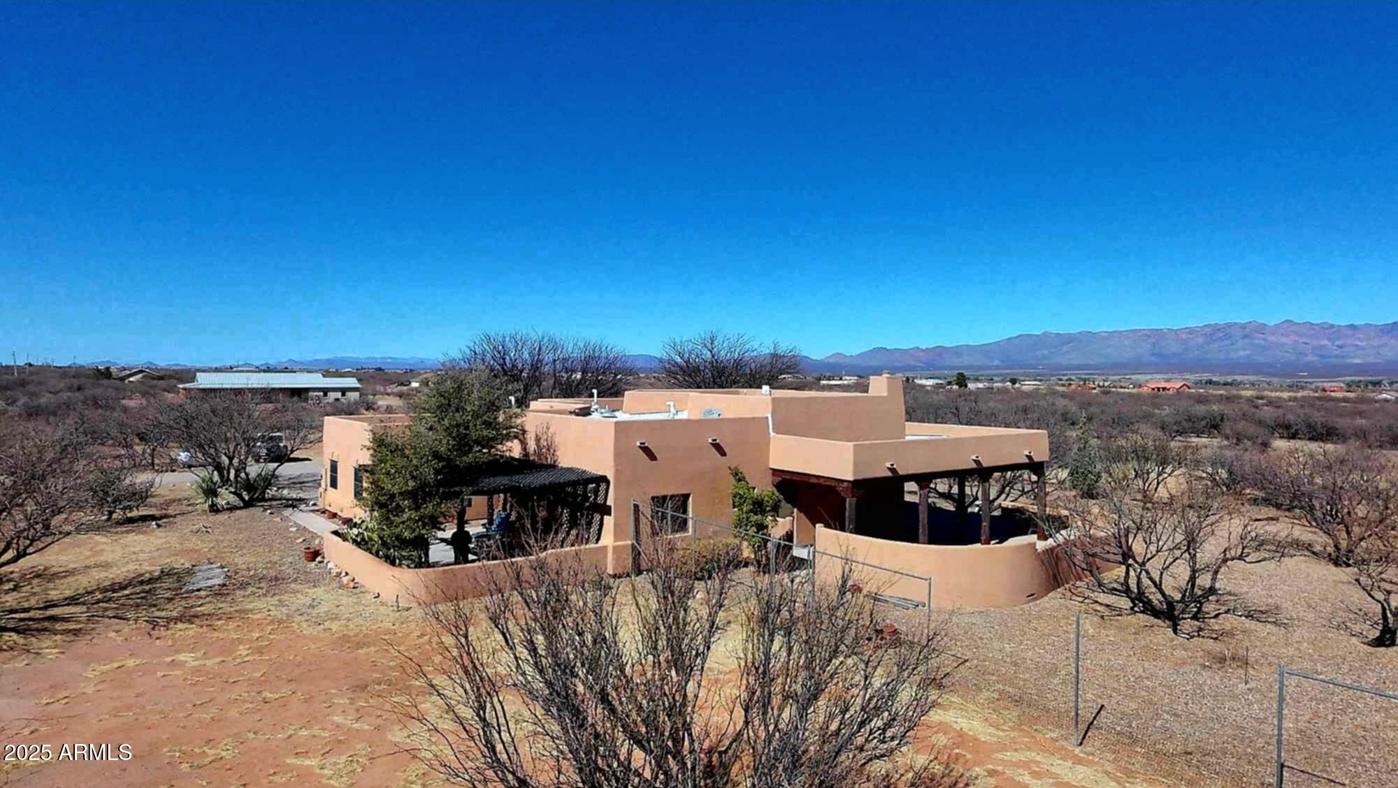 8765 South Airstrip Road Hereford, AZ 85615 - Photo 7 of 47 a view of a terrace with a snow