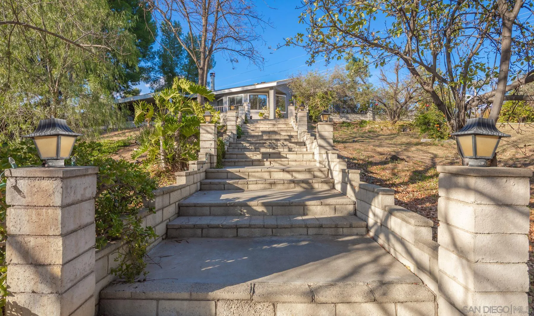 36005 Glen Oaks Road Temecula, CA 92592 - Photo 2 of 16 a view of a pathway both side of building