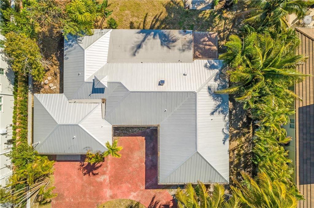 2195 Sheepshead Drive Naples, FL 34102 - Photo 13 of 14 an aerial view of a house with swimming pool