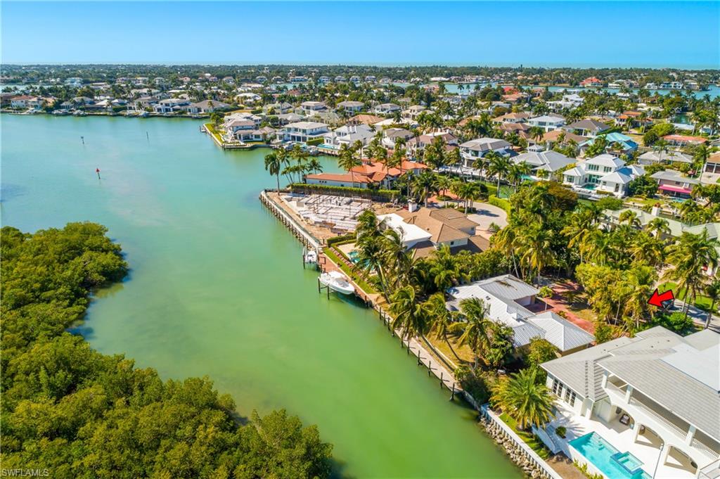 2195 Sheepshead Drive Naples, FL 34102 - Photo 7 of 14 an aerial view of residential houses with outdoor space and river