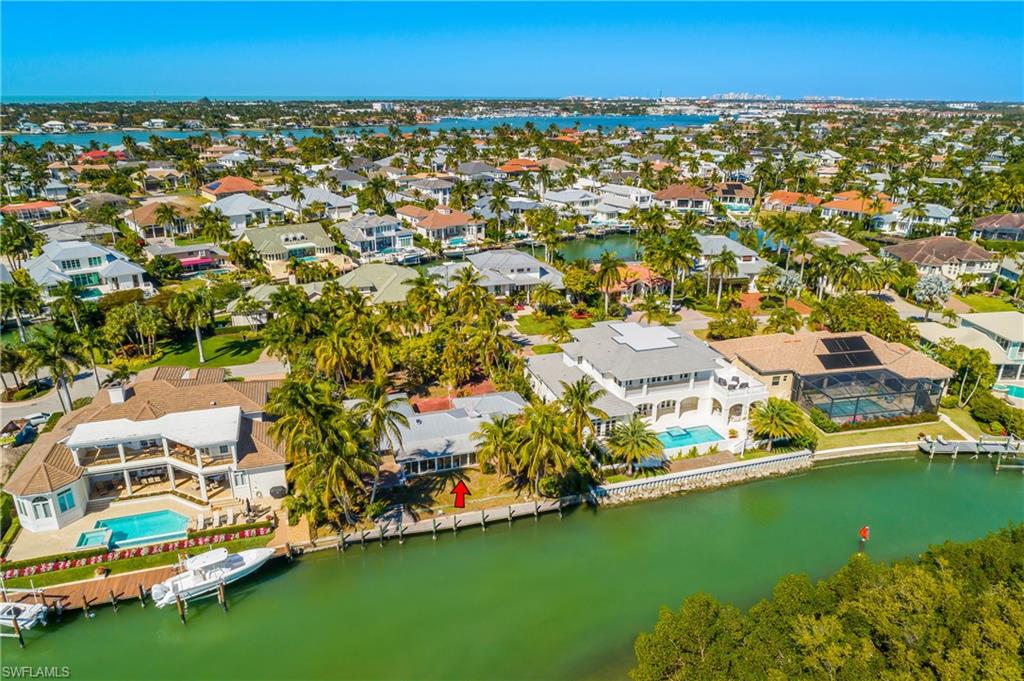 2195 Sheepshead Drive Naples, FL 34102 - Photo 9 of 14 an aerial view of residential houses with outdoor space and swimming pool