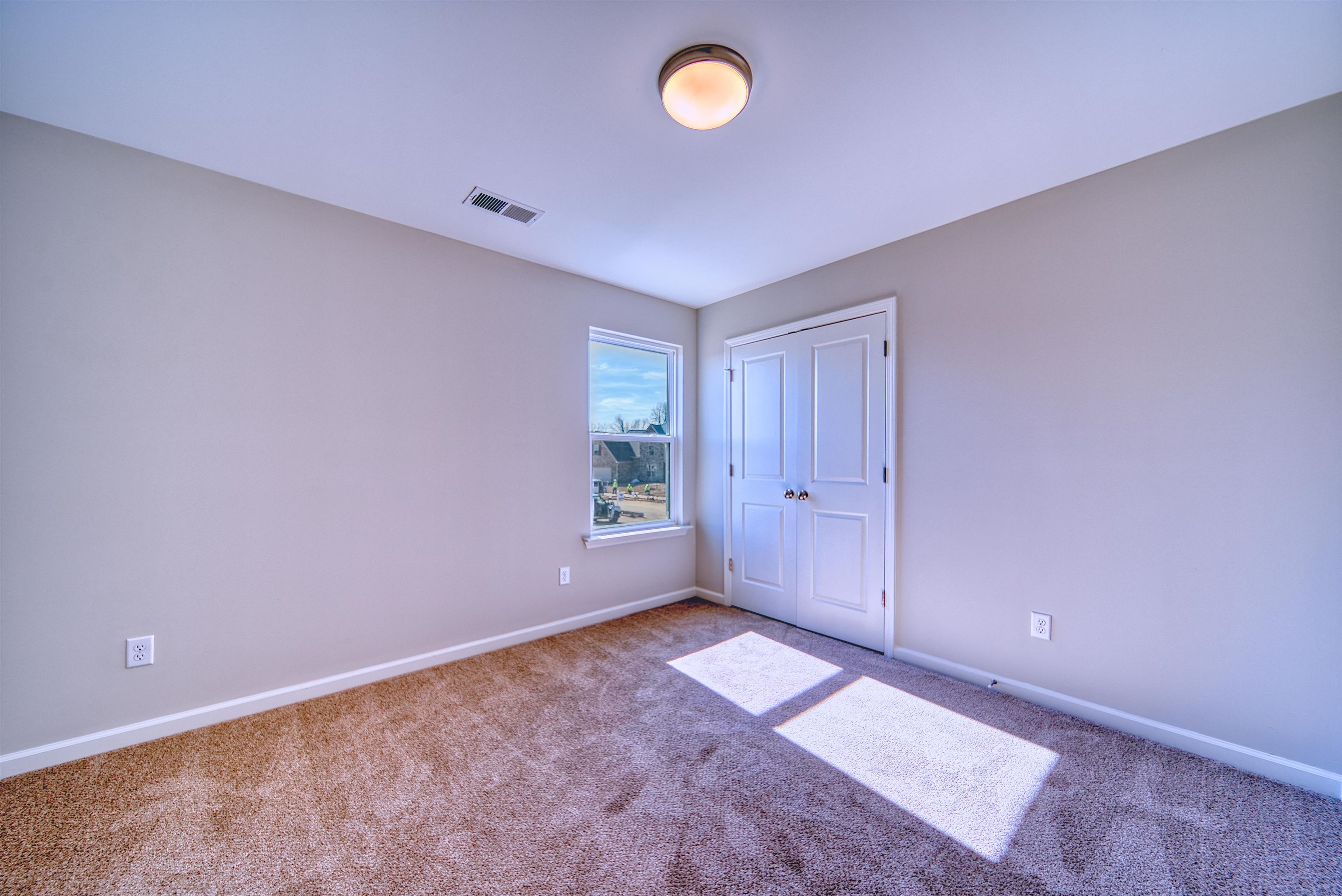 196 Como Lane Atoka, TN 38004 - Photo 24 of 40 an empty room with a empty space and a window
