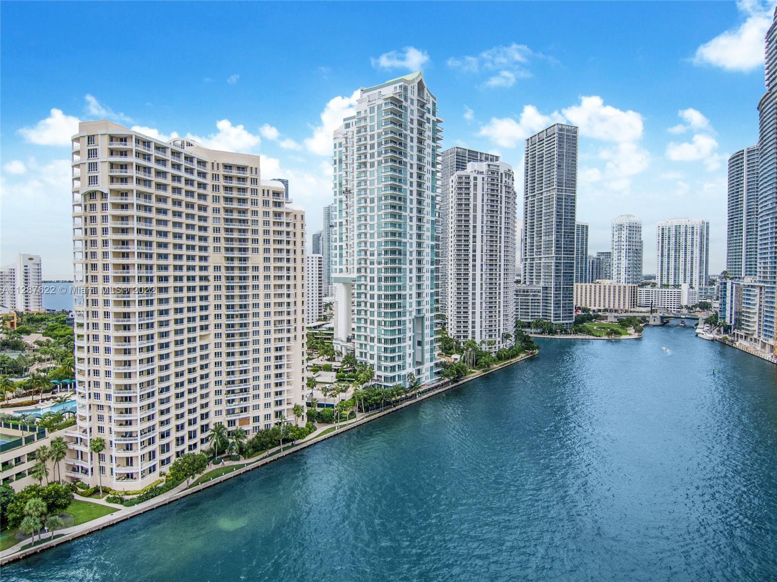 888 Brickell Key Drive, Unit 1508 Miami, FL 33131 - Photo 11 of 12 a view of a city with tall buildings