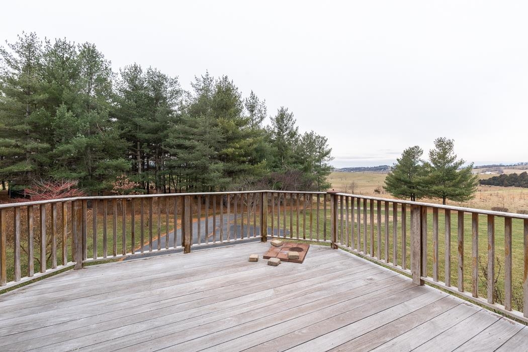 1068 Entry School Road Fishersville, VA 22939 - Photo 17 of 74 a view of balcony with deck and wooden floor