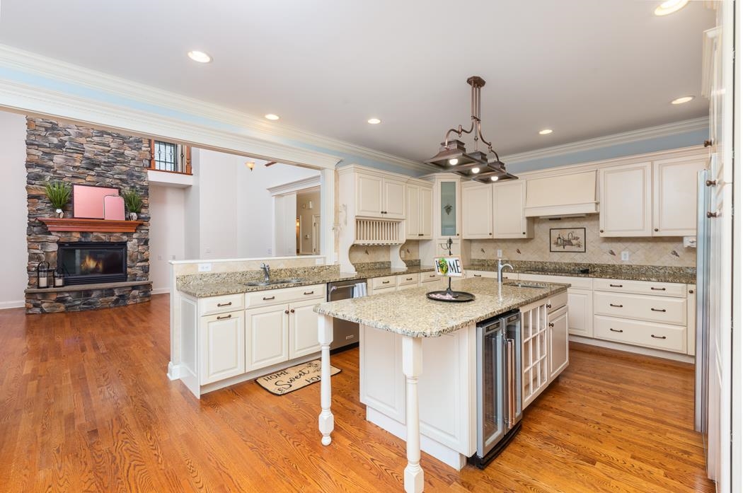 1068 Entry School Road Fishersville, VA 22939 - Photo 29 of 74 a kitchen with a sink stove and cabinets