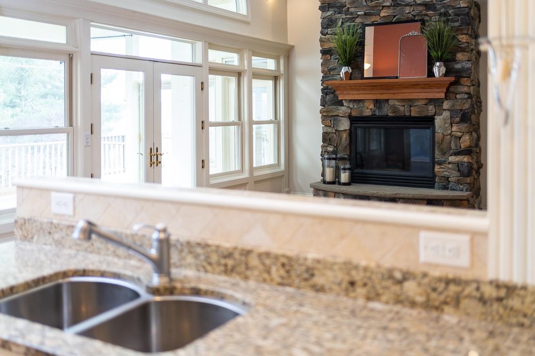 1068 Entry School Road Fishersville, VA 22939 - Photo 30 of 74 a kitchen with a sink and a fireplace