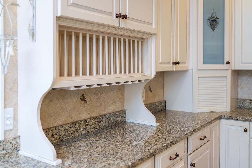 1068 Entry School Road Fishersville, VA 22939 - Photo 34 of 74 a kitchen with granite countertop a sink and a granite counter tops